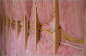 Fiberglass batt insulation installed in a wall